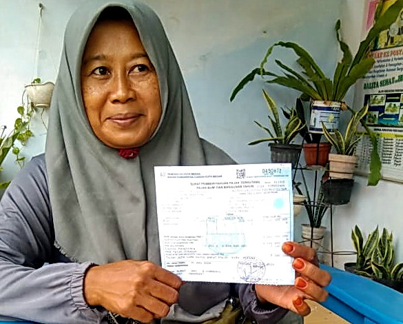 Partini (57) warga Jalan Sidomulio Lingkungan 27 Kelurahan Tanjung Mulia Kecamatan Medan Deli Kota Medan 'galau' akibat masalah tanahnya seluas 15.080 meterpersegi (1,5 hektar) di Kelurahan Kota Bangun Medan Deli tak kunjung tuntas.