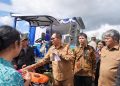 Gebrakan Nyata Pemkab Taput: Kunker di Pangaribuan, Bupati JTP Salurkan Bantuan dan Pastikan Perbaikan Infrastruktur