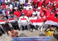 Pupuk Nasionalisme, Pemkab Taput Bagikan 1.814 Bendera Merah Putih di Siborongborong