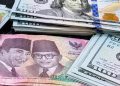 Rupiah Berpotensi Sentuh Angka Rp18.500 per Dolar AS